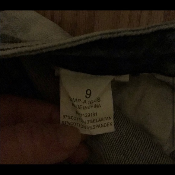 Machine acid washed distressed jeans with jewel embellishments - Picture 5 of 6